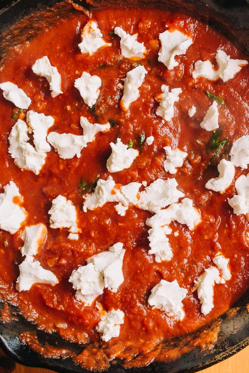 goat cheese in crushed tomatoes