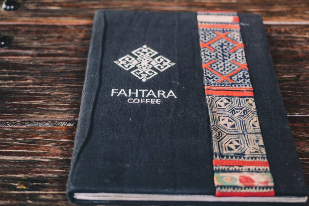 Fahtara coffee menu that is woven with ornate Thai designs
