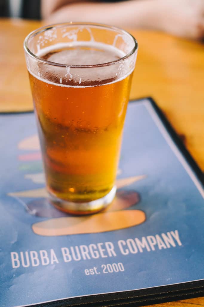 bubba's burgers menu with a beer on top