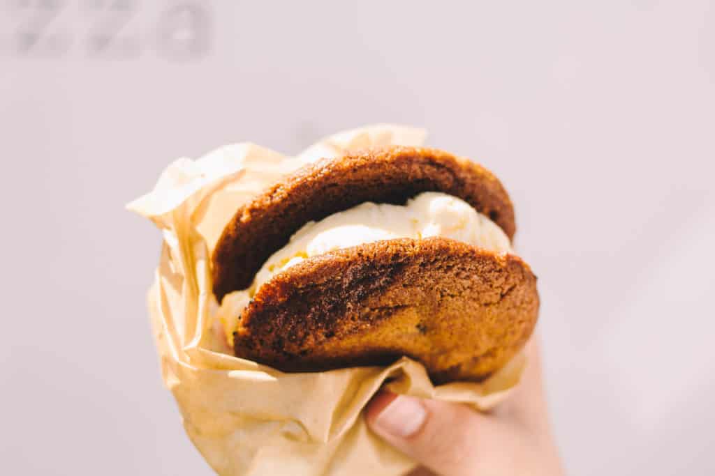 hand holding an ice cream cookie sandwich