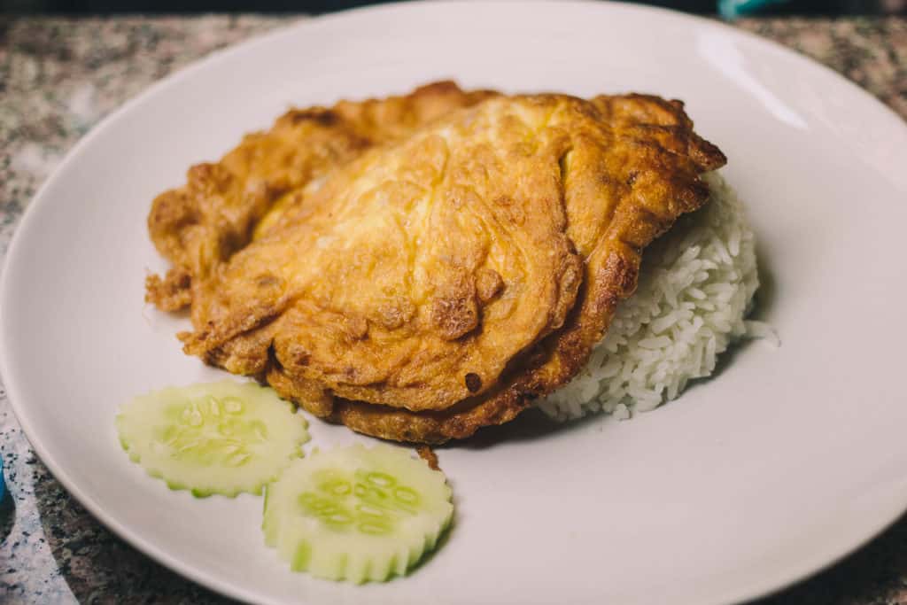 thai style fried omelette with cucumbers and rice