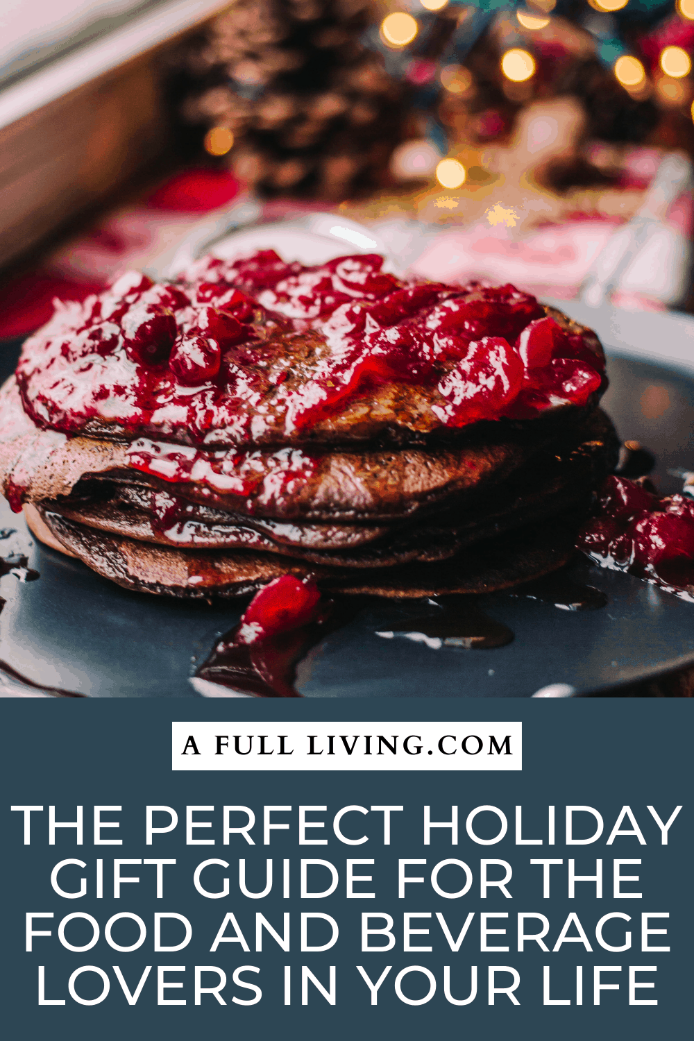 stack of chocolate pancakes with cherry topping twinkling holiday lights in the background with text he Perfect Holiday Gift Guide for the Food and Beverage Lovers in Your Life