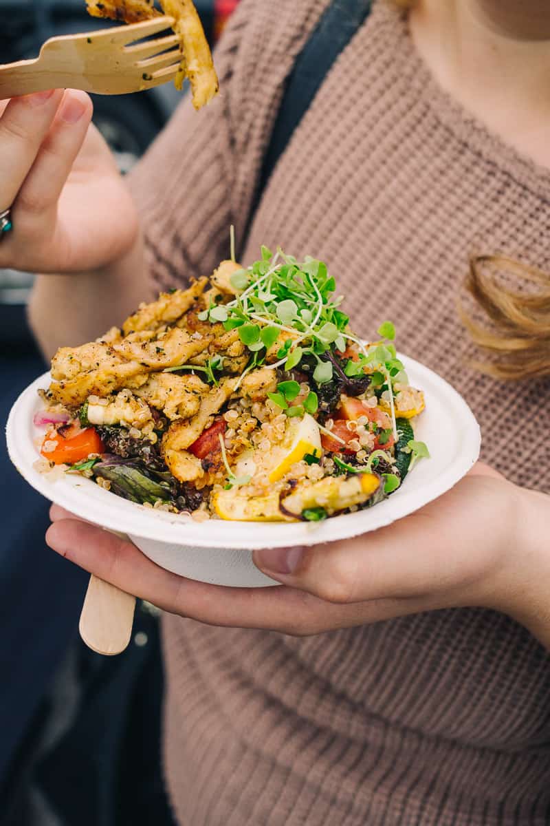 Radish street food at the sara hardy farmers market with a vegan bowl packed with veggies