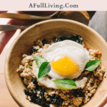 Graphic with text of Low Carb Thai Basil Chicken with a fried egg on top