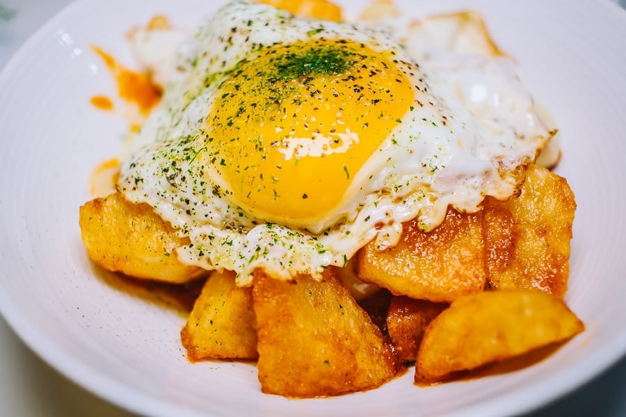 potatoes with an egg on top
