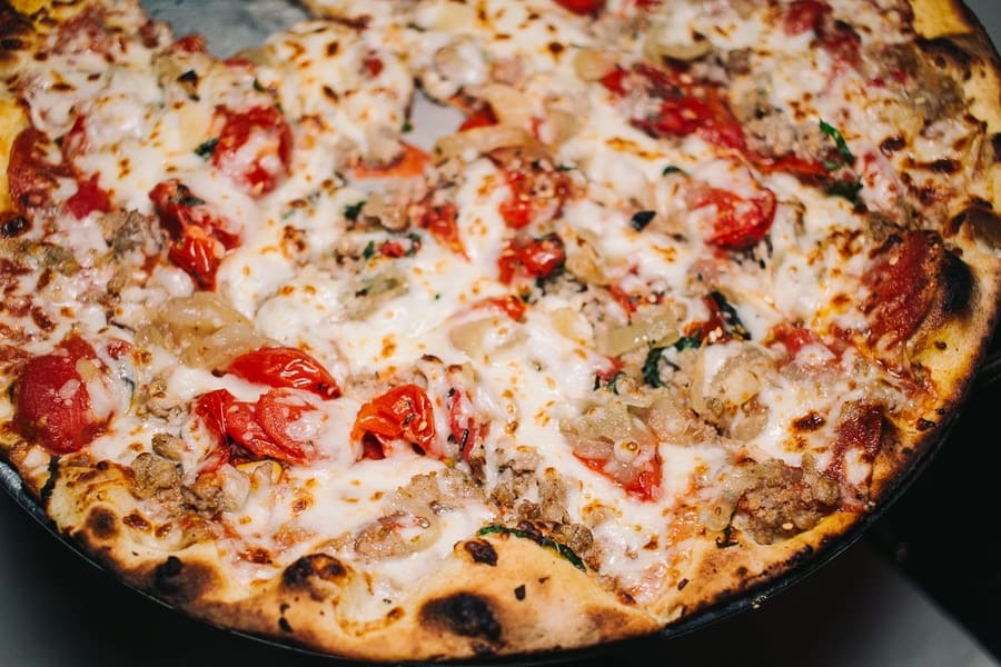 pizza with sausage and red pepper