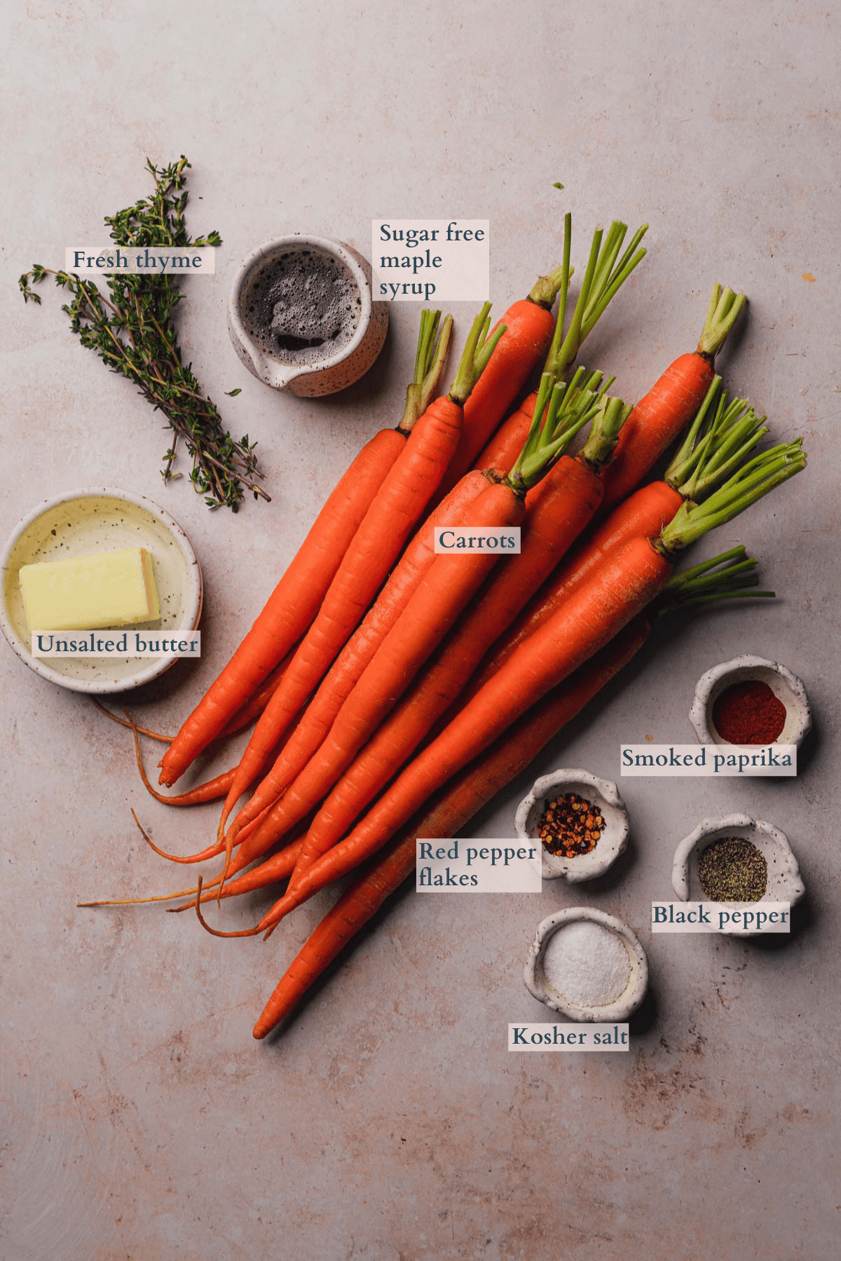 keto maple glazed carrots recipe ingredients with seasonings and ingredients in different bowls with text to denote different ingredients
