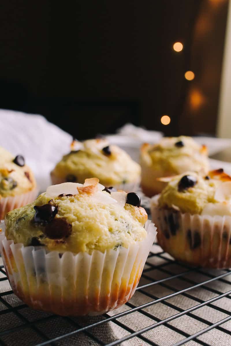 Low Carb Coconut and Chocolate Chip Protein Muffins on a plate with a white linen napkin