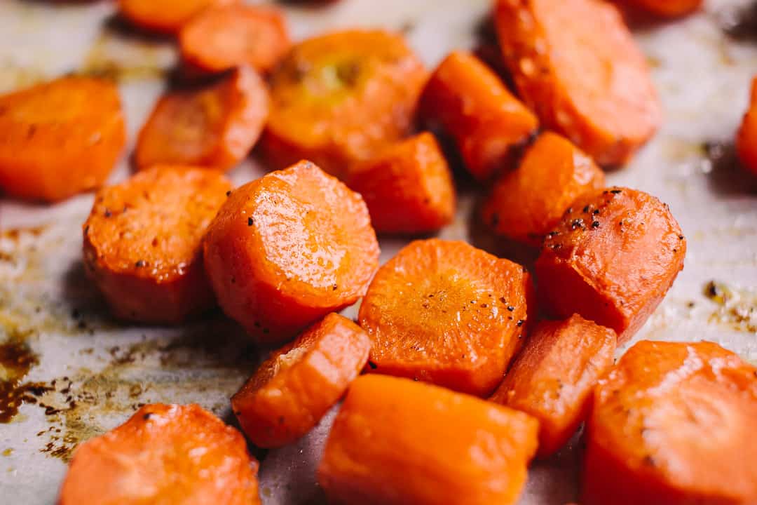 roasted carrots on parchment paper