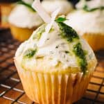 Low Carb Thai Basil Lime and Coconut Cupcakes topped with coconut