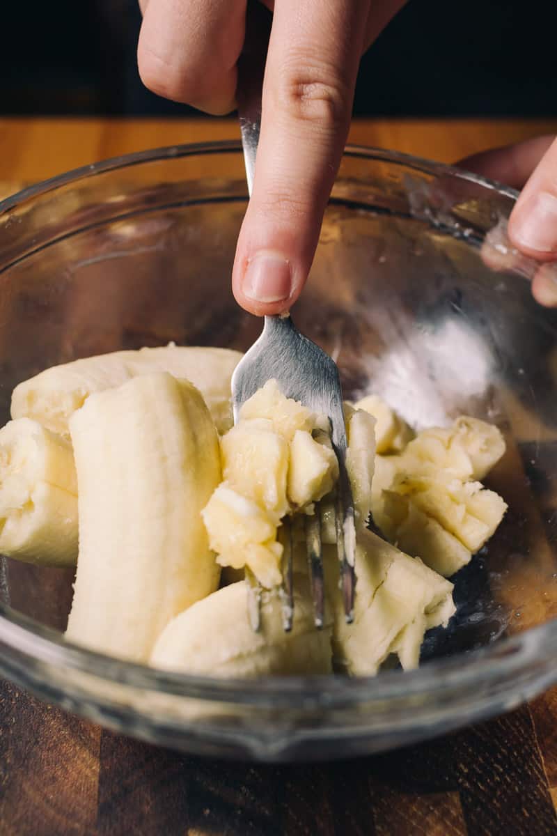 Mashing bananas with fork