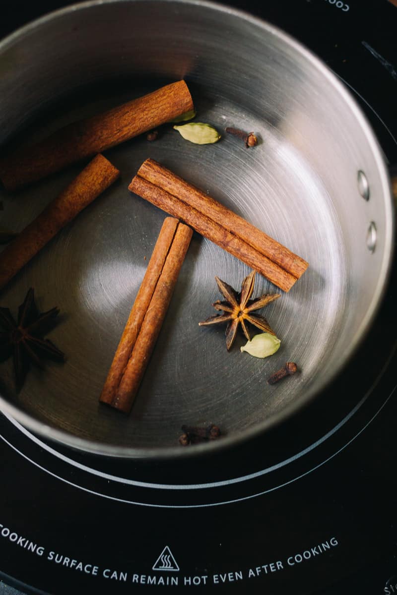 cinnamon and star anise in sauce pan