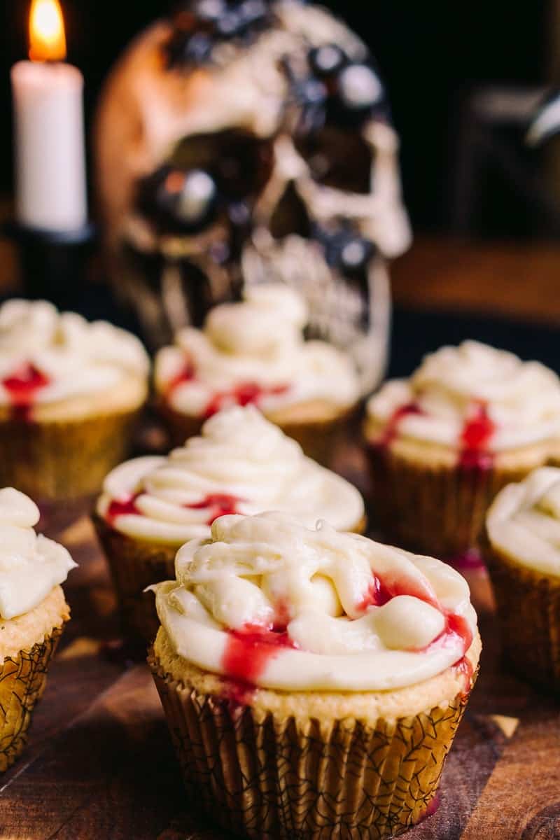 45 degree, vanilla cupcake with cream cheese frosting and raspberry blood