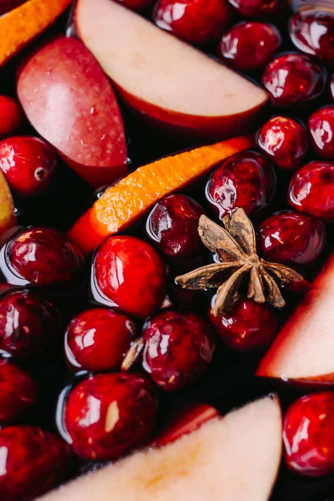 sangria with cranberries, oranges, apples and star anise