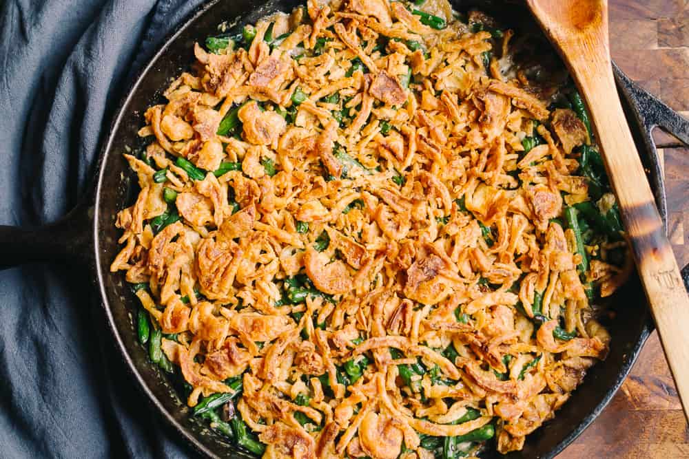 green bean casserole in a cast iron skillet