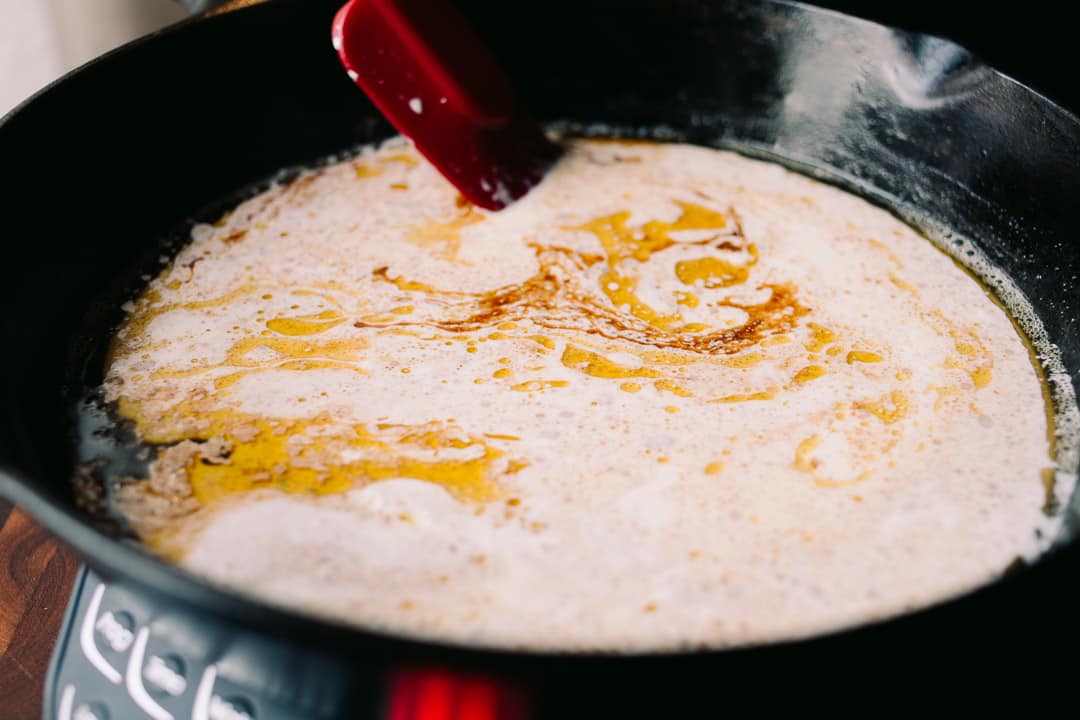 cream and brown butter in cast iron skillet