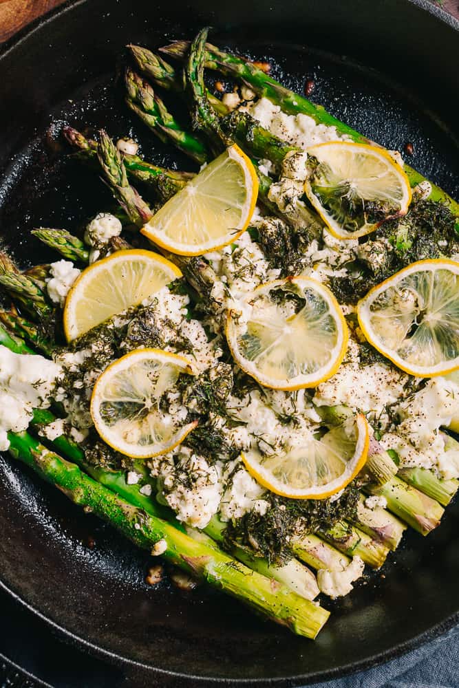 flatlay of asparagus goat cheese and lemon