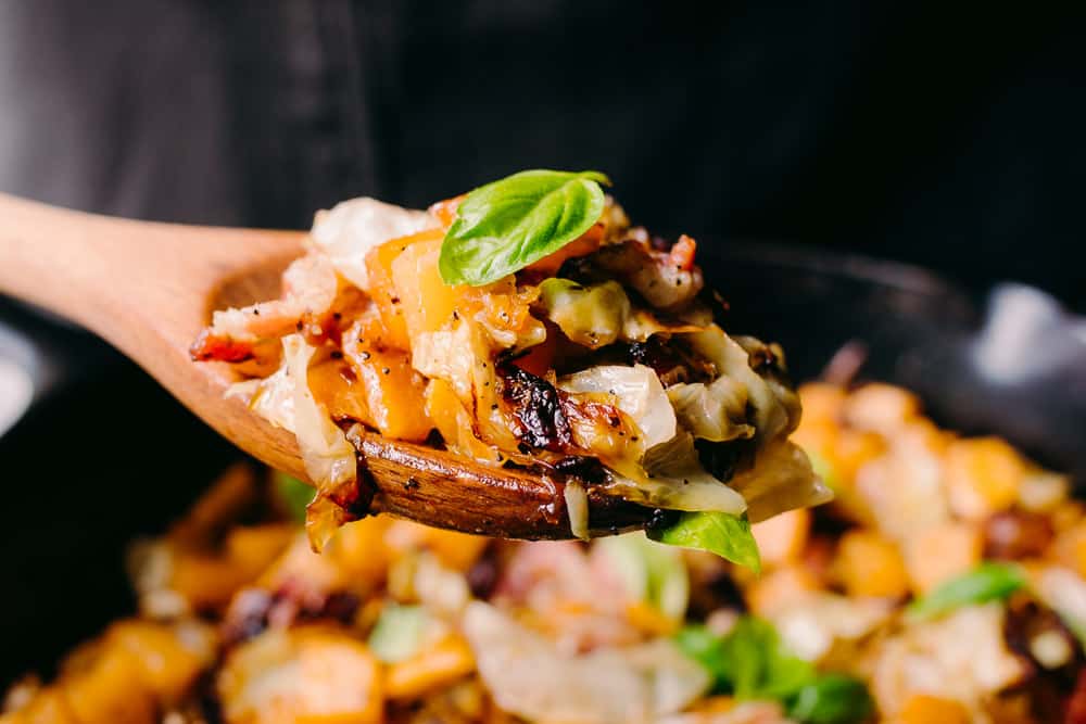close up shot of roasted rutabaga with basil