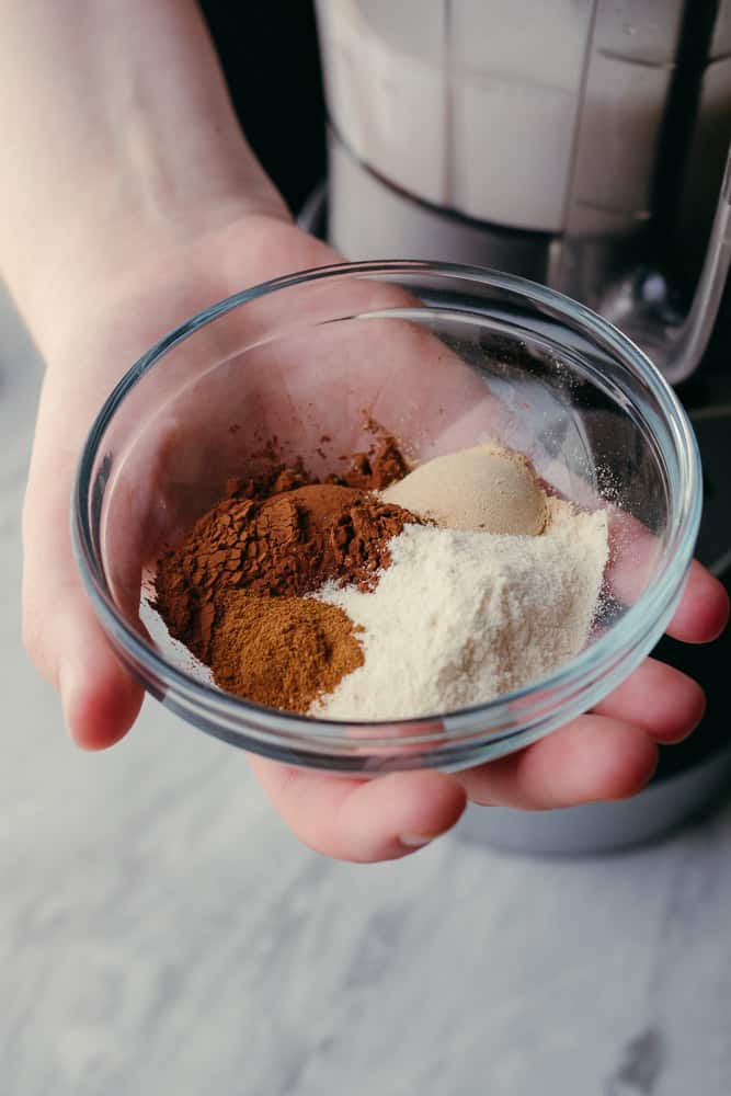 handful of dry ingredients for chocolate maca elixir