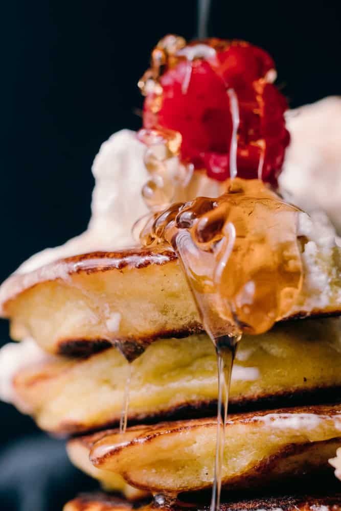 syrup drip on a stack of pancakes
