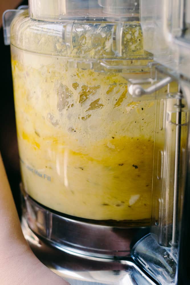 making honey lemon vinaigrette in a food processor
