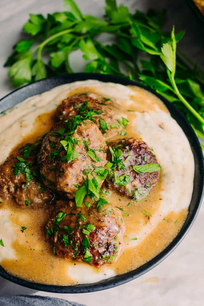 delicious bowl of keto swedish meatballs with mashed turnips