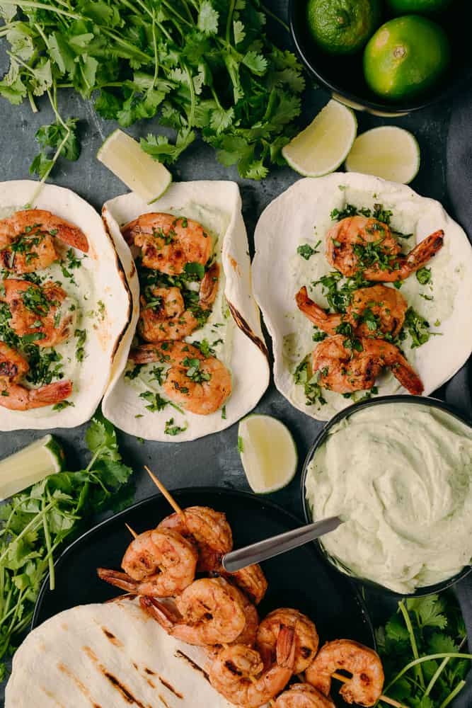 chipotle lime shrimp wraps with avocado crema and cilantro