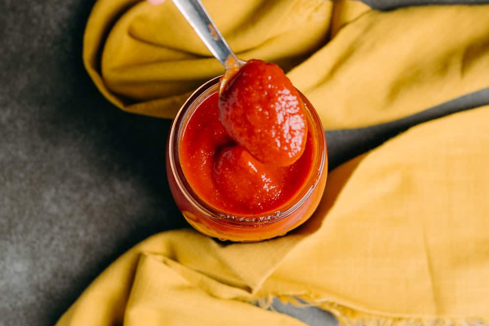 yellow napkin with bright red bbq sauce