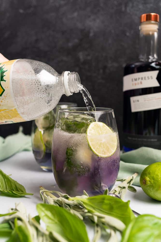 adding diet tonic water to a gin and tonic