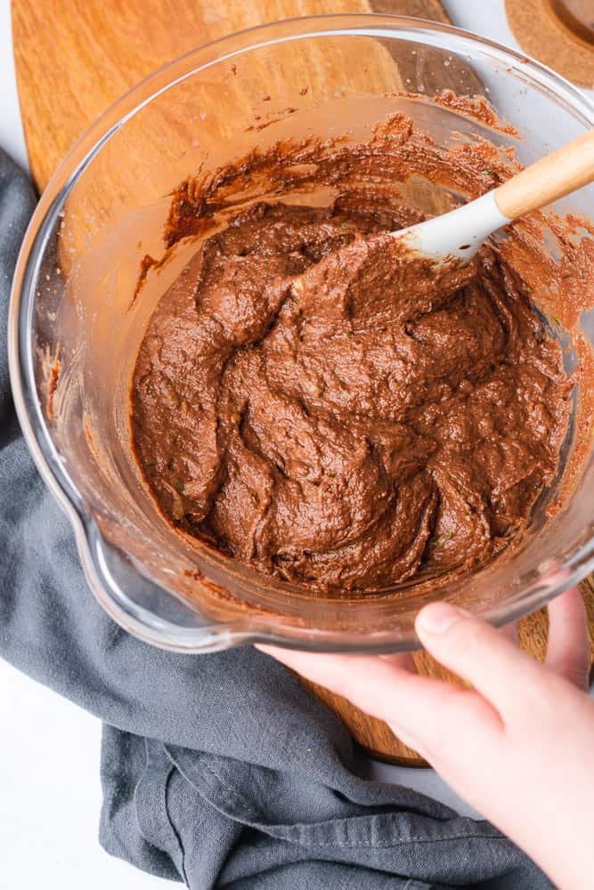 mixing chocolate muffin batter 