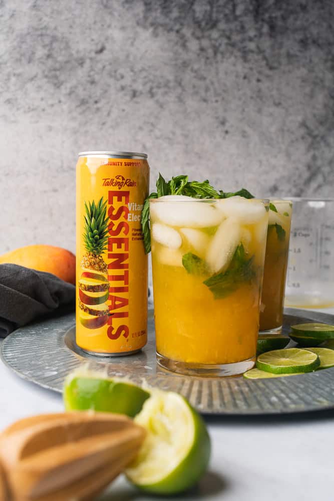 mango mojito with a can of essentials pineapple mango