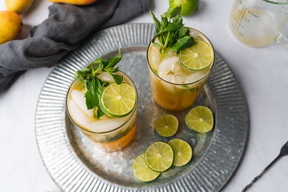 mango mojitos on a silver tray