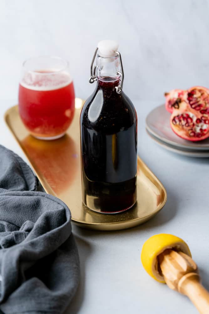 delicious sugar free keto grenadine with fresh pomegranate lemon and a cocktail