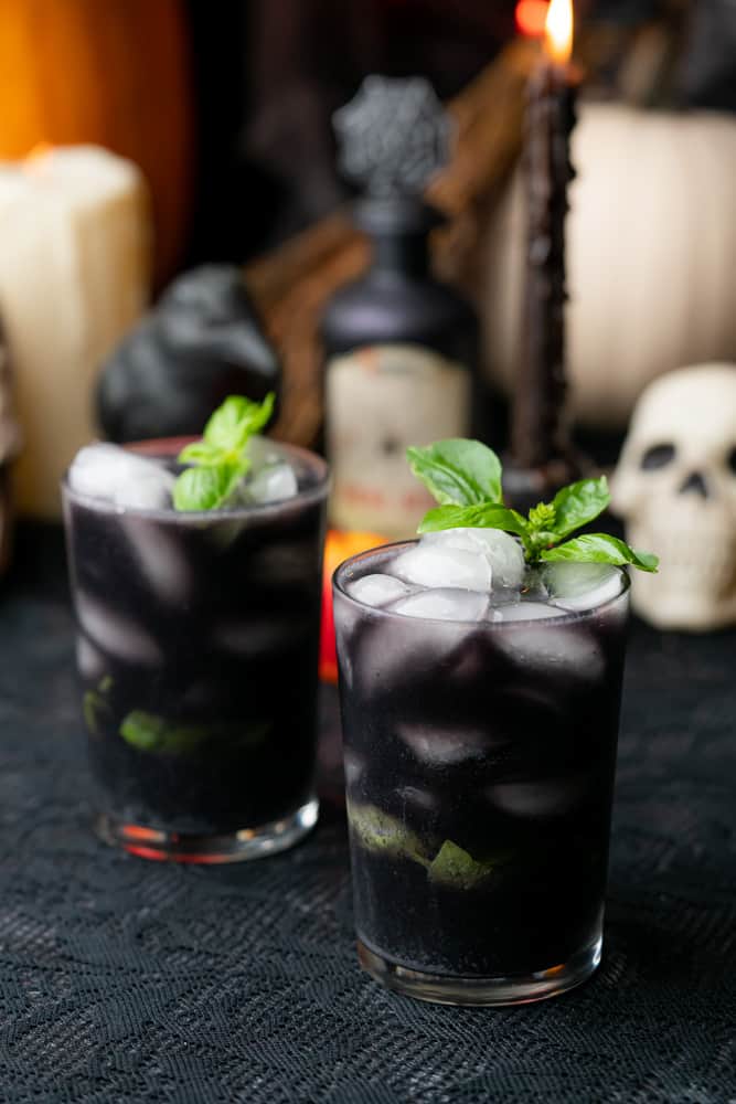 gin blueberry basil smash with skeleton and potions