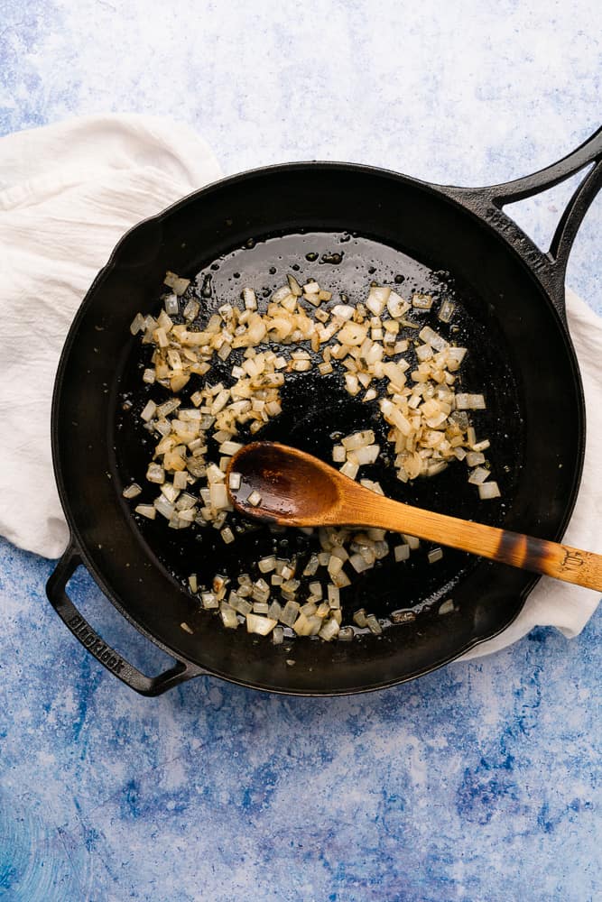 cooked onions and garlic with seasonings in a skillet