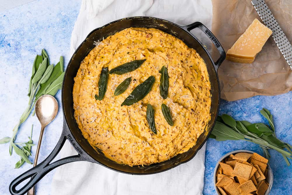 warm baked pumpkin goat cheese dip with bacon and sage