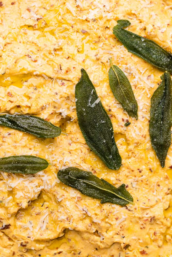 crispy fried sage on pumpkin goat cheese dip