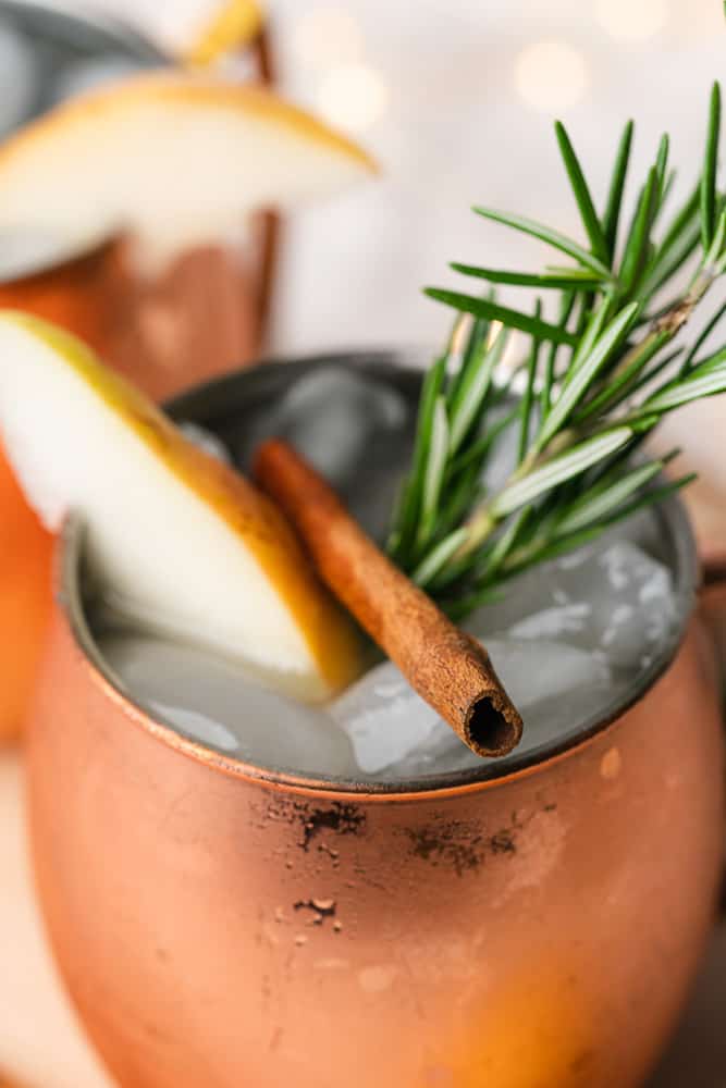 moscow mule mug with rosemary cinnamon and pear