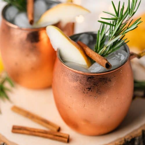 gorgeous holiday moscow mules with rosemary and pear