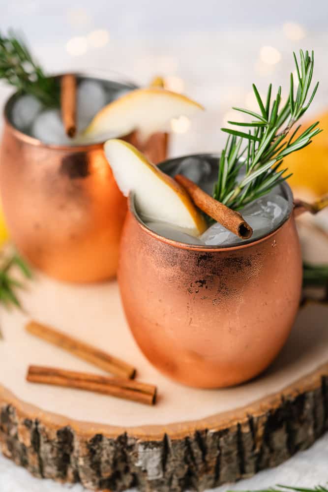 gorgeous holiday moscow mules with rosemary and pear