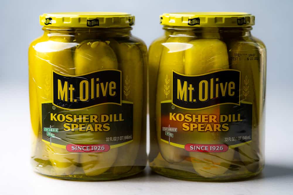 two large jars of bulk kosher dill pickles by mt olive from Costco