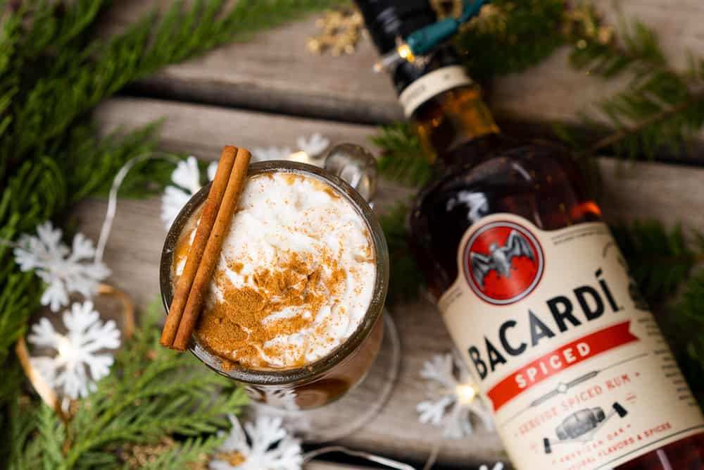 bottle of bacardi with a hot buttered rum