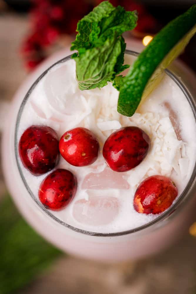 top of a cranberry coconut christmas mojito with mint 