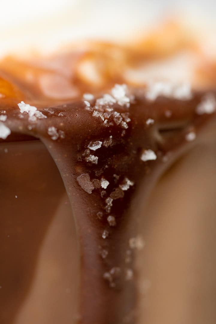 closeup shot of chocolate drizzle with salt 