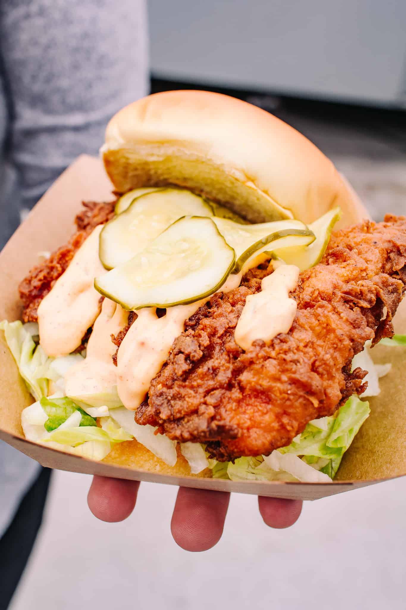 fried chicken sandwich from glendale ave at the little fleet with pickles and spicy aioli