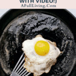 graphic with text of Lodge Cast Iron Care and Cleaning (The Dos, Don'ts and Myths - With Video!) with an egg frying on a cast iron skillet
