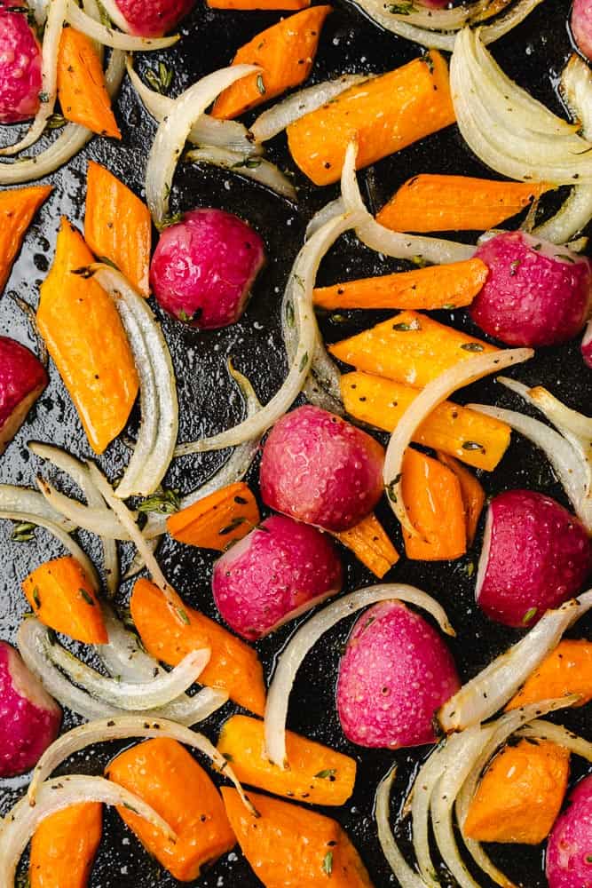 raw radishes and carrots with onions with thyme 