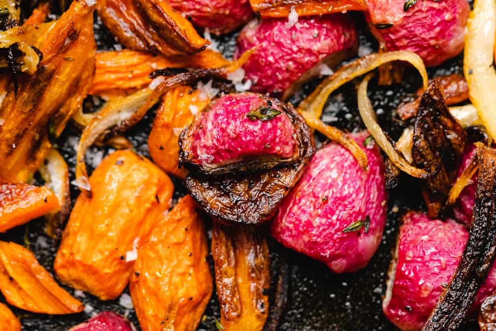 close up shot of roasted radishes and carrots 