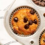 almond flour banana muffin with chocolate chips in a silver muffin tin