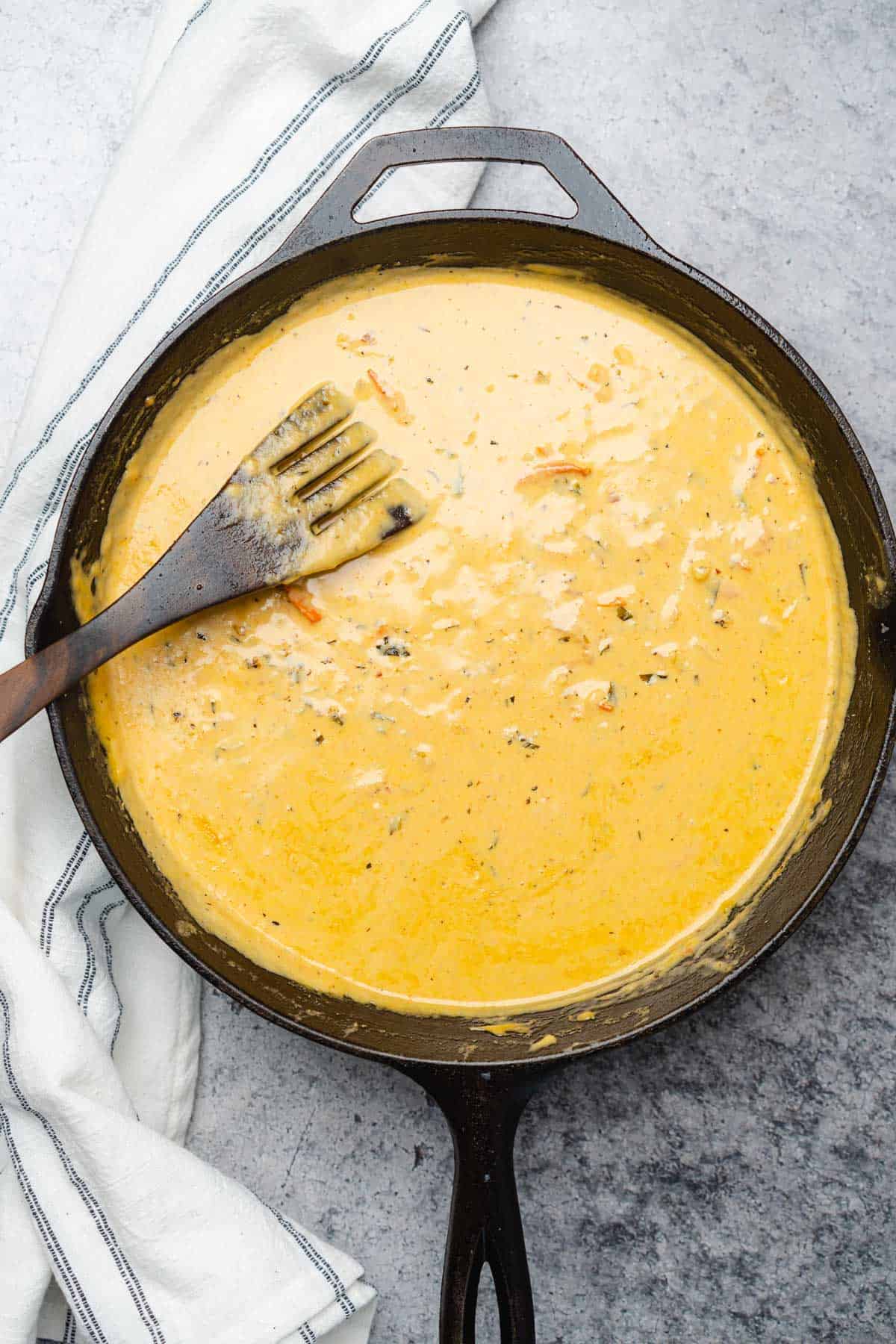 creamy sauce in a cast iron skillet